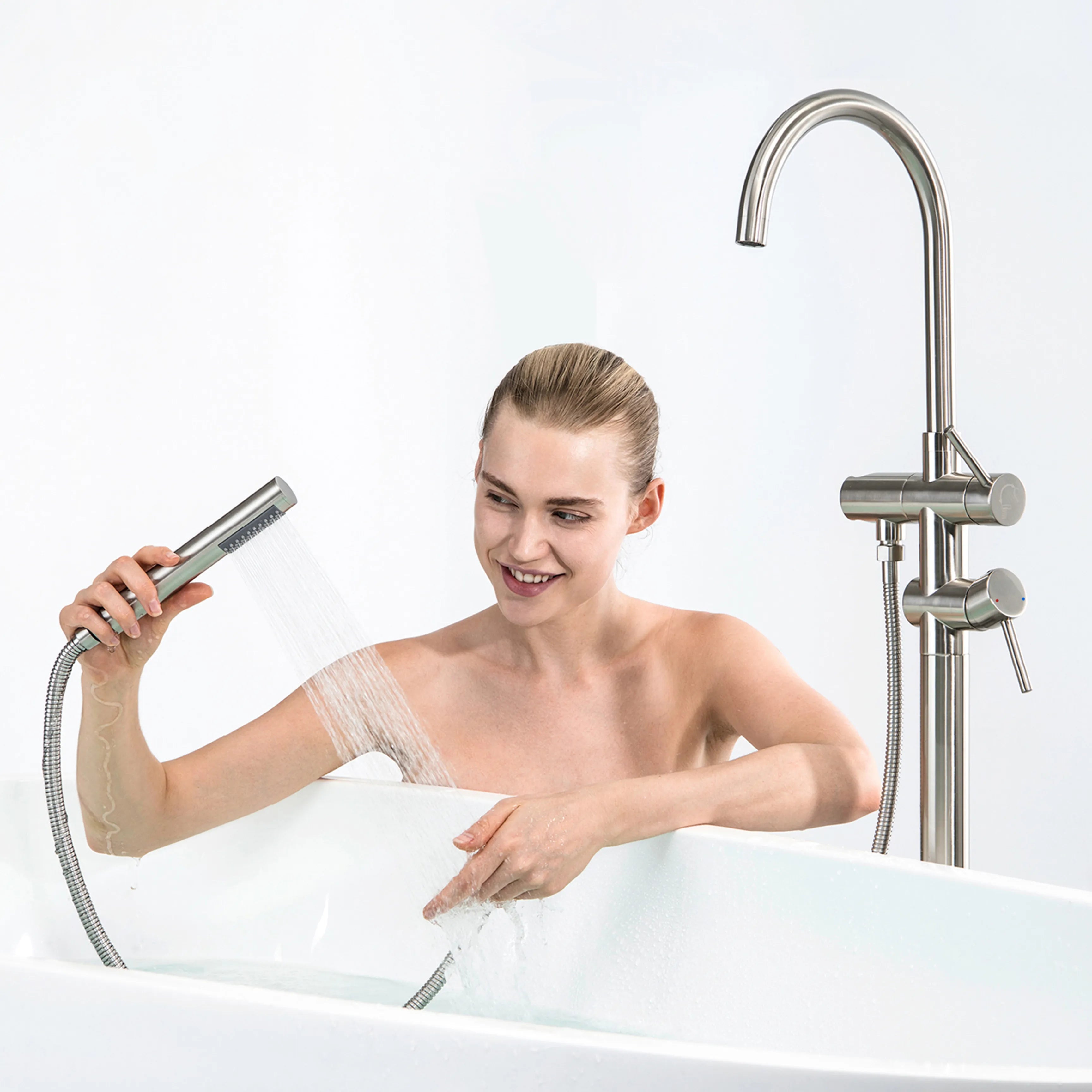 Brushed Nickel Freestanding Tub Faucet With Tub Filler And Handheld Shower Head